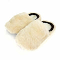 Alpaca slippers on a white background