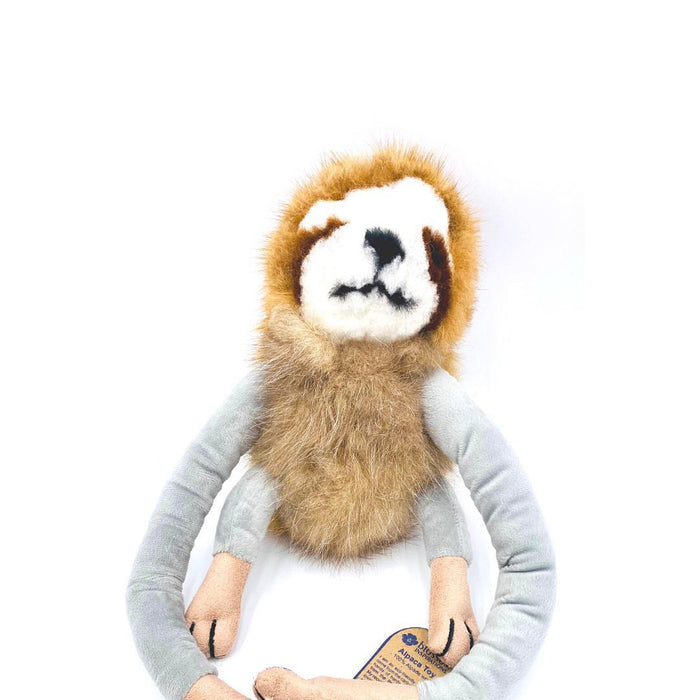 A plush toy resembling a sloth with a beige body, gray arms, and a brown face.