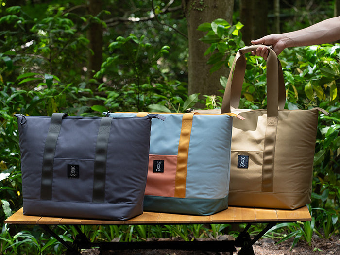 Glacier Bundle: 3 stylish insulated tote bags in gray, blue, tan on wood bench