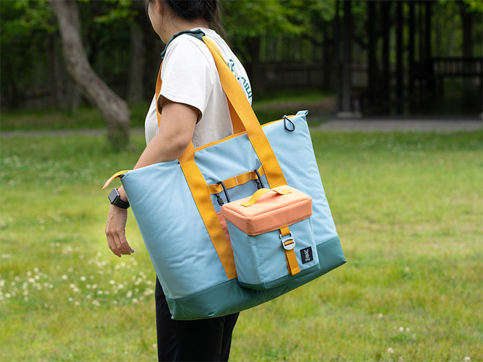 Glacier Bundle: light blue teal tote with orange straps and lunchbox