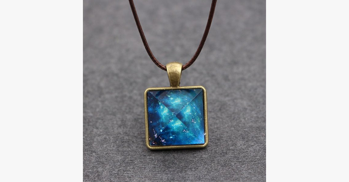 Glowing Pyramid Pendant with Blue Crystal – Add Some Shine and Color To Your Collection