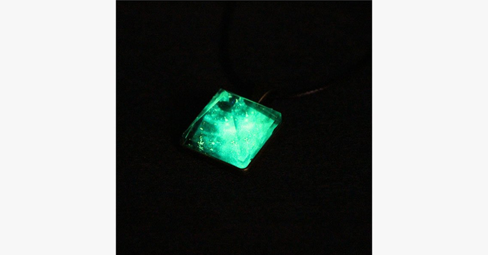 Glowing Pyramid Pendant with Blue Crystal – Add Some Shine and Color To Your Collection
