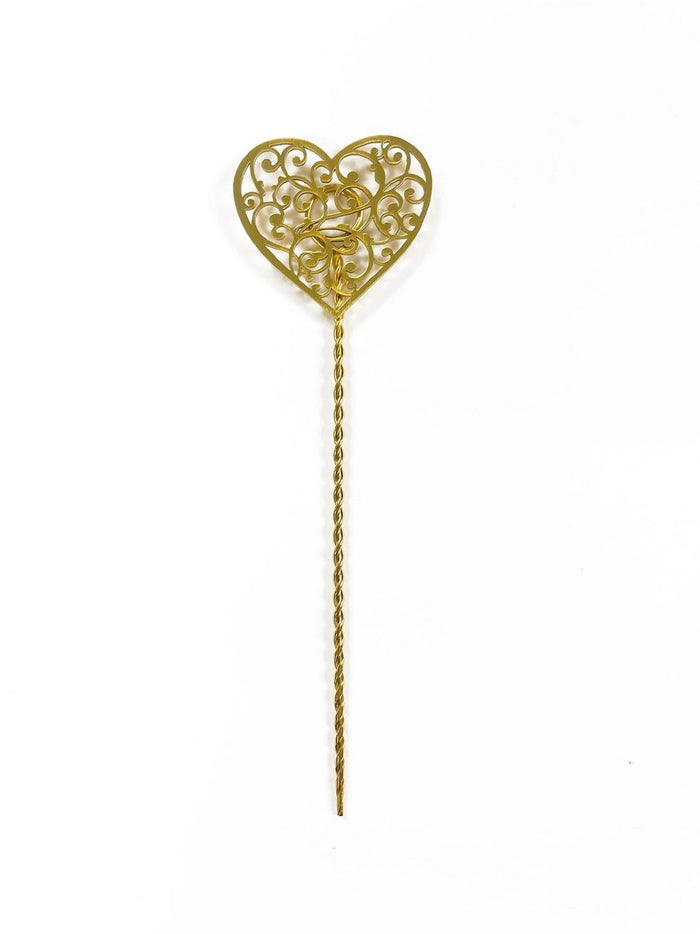 Gold heart-shaped plant stake on a white background