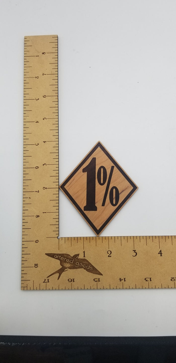 One percent wooden ornament