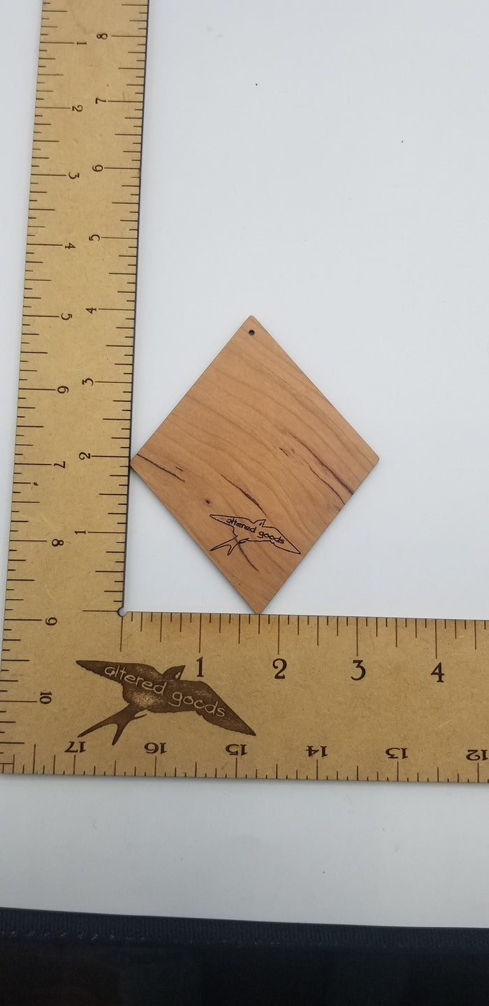 One percent wooden ornament