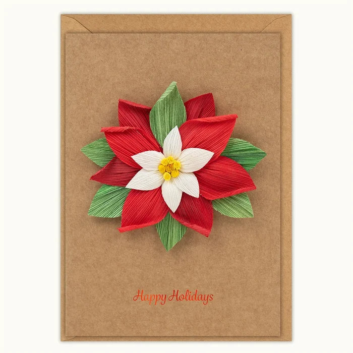 A brown kraft paper holiday card with a 3D poinsettia flower made from layered paper petals in red, white, and green, with 'Happy Holidays' written in red script at the bottom.