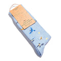 Conscious Step blue crew socks with songbirds on a white background