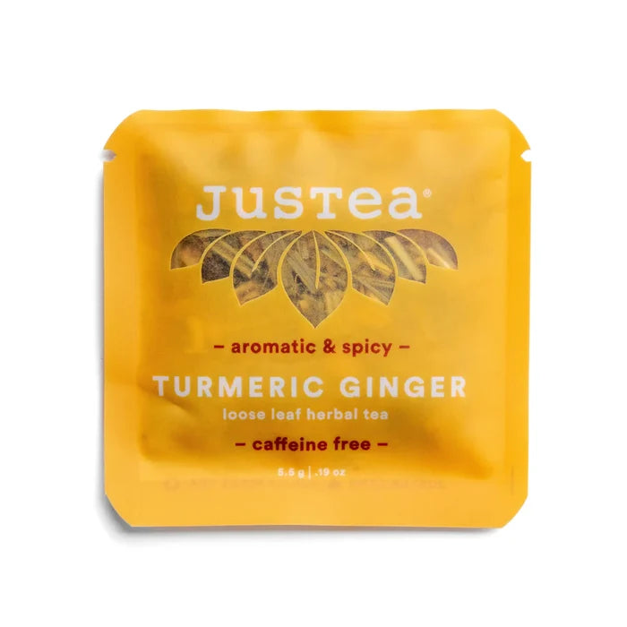 Justea Turmeric Ginger tea sample package on a white background