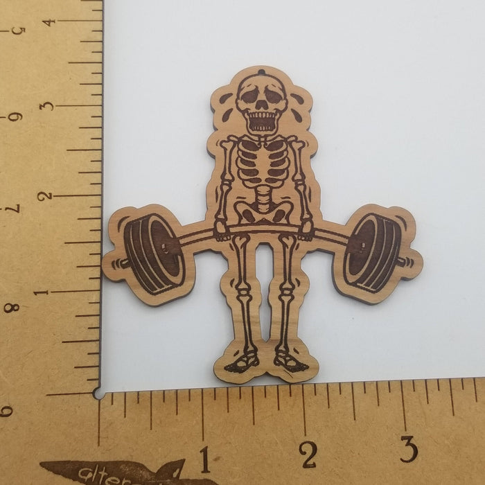 Weight lifting skeleton ornament